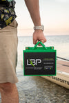 LBP 12V 35Ah Lithium Battery featuring compact green and black casing, ideal for trolling motors, campers, and portable power setups – Lithium Battery Power, LLC.